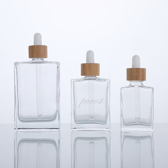 Flacone cosmetico quadrato in vetro piatto da 30 ml con contagocce e tappo in bambù